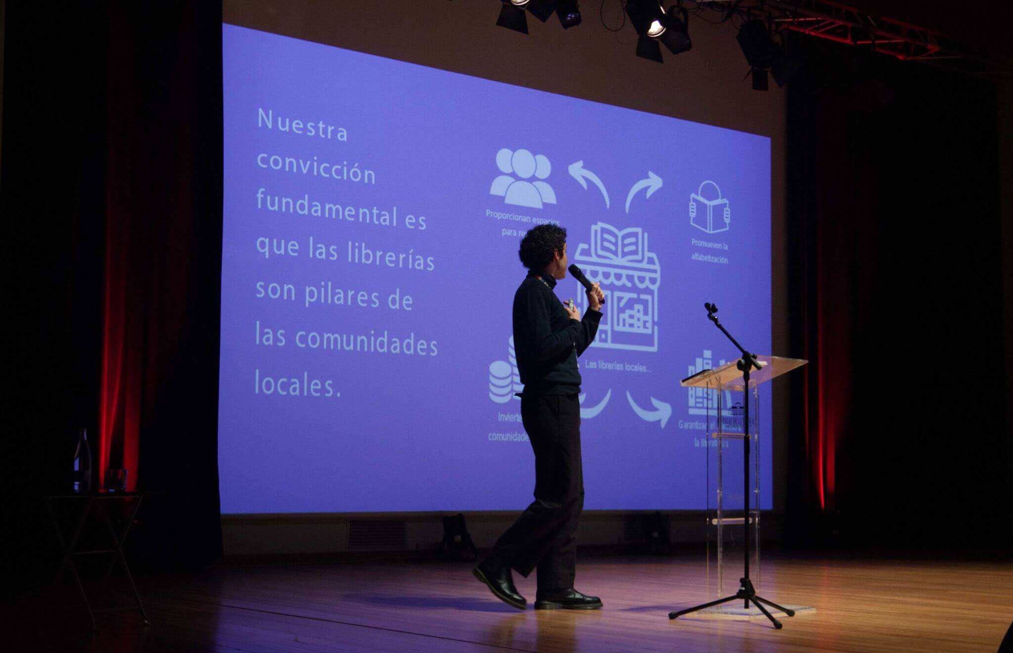 Policy Assistant Lorenzo Dall'Omo on stage presenting EIBF.