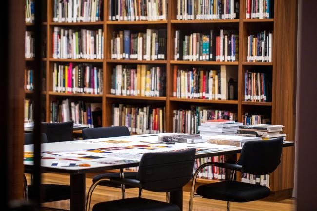 Library desk and bookshelves