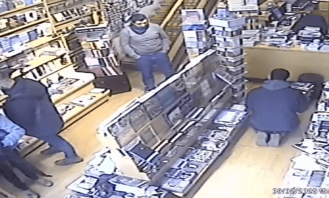 Photo: CCTV shows Israeli police raiding the Educational Bookshop in East Jerusalem