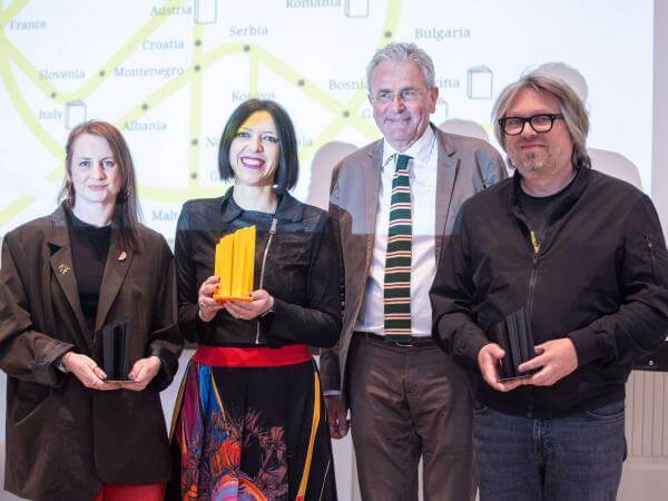 the two special mentions and the laureate of EUPL 2025 with the Jury president